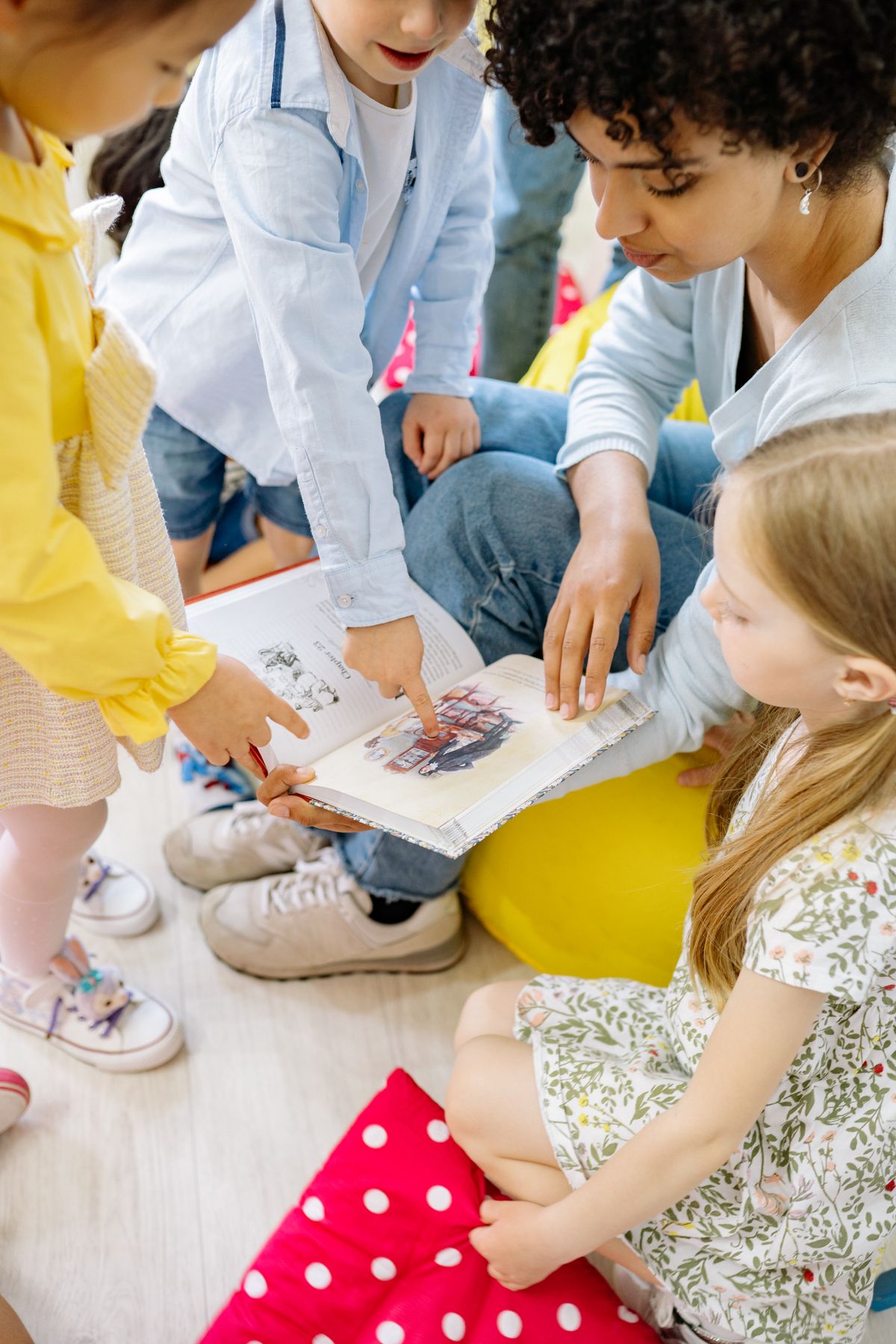 Children sharing a picture book during storytime